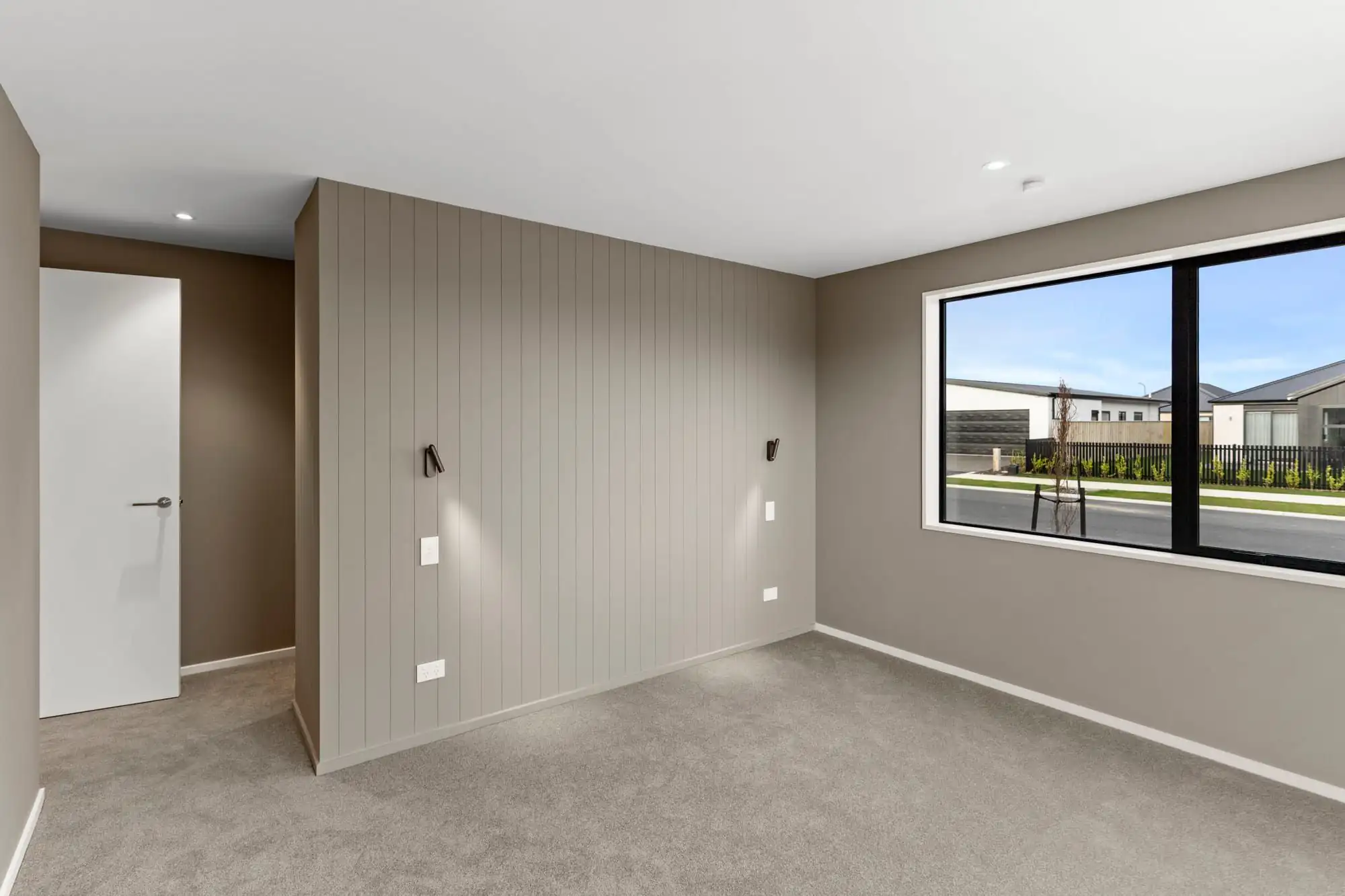 Panelled feature wall in an empty bedroom before furnishing