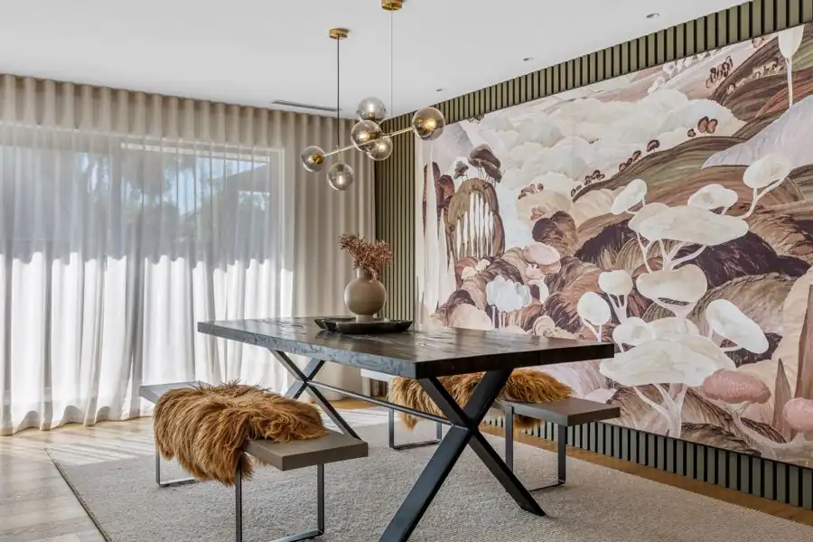 Freshly painted dining room with a mural feature wall in a Mairehau home